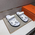 Hermès Cutout Slide Sandals